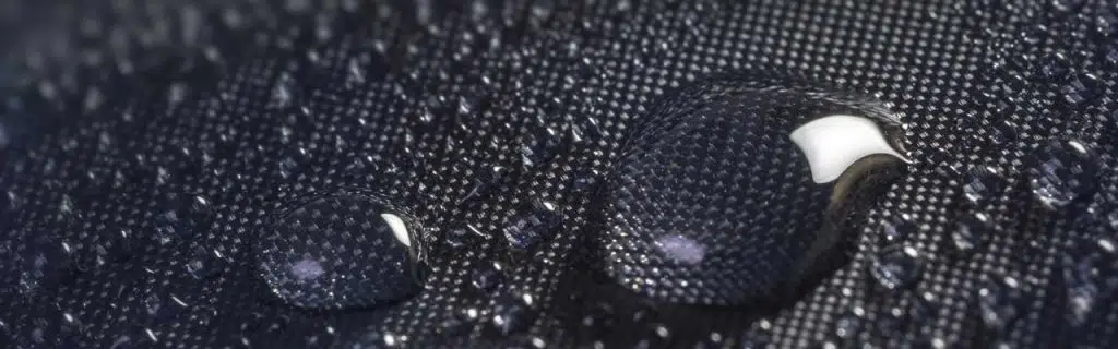 Photo of water sliding through waterproof fabrics.