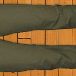 a pair of fjallraven pants on a wooden floor.